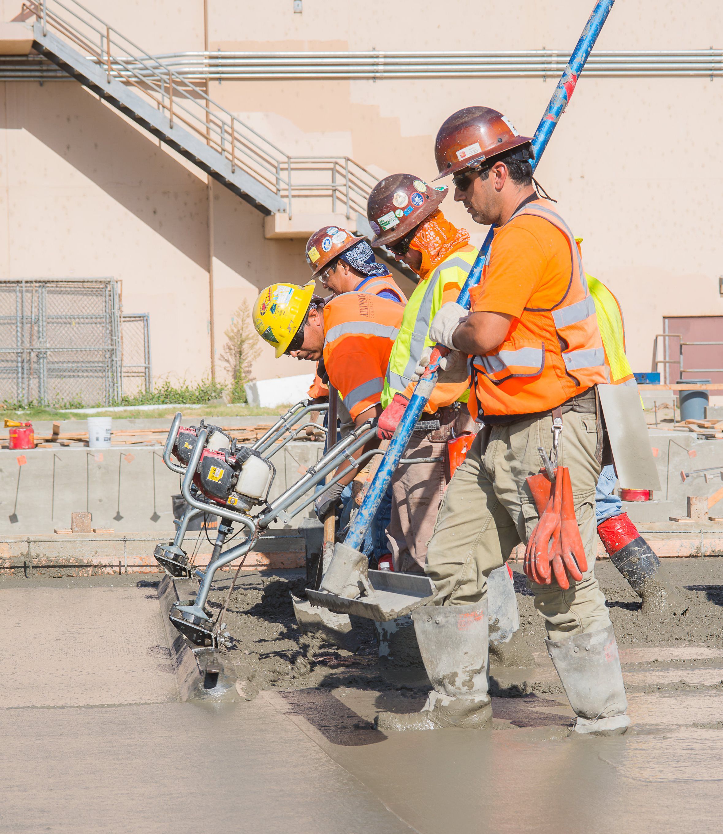 Temporary project photo: crew pouring concrete